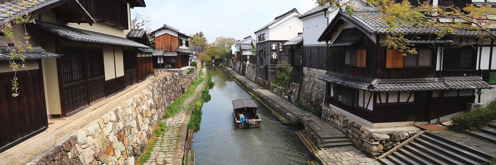 A Canal with adjacent housing in Omihachiman, Japan